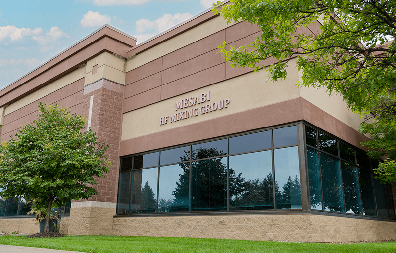 Exterior view of the brown factory building in Oakdale, USA, which belongs to the HF GROUP