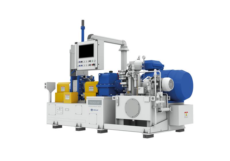 Laboratory mixers with control panel, blue units, and complex hydraulic assemblies.