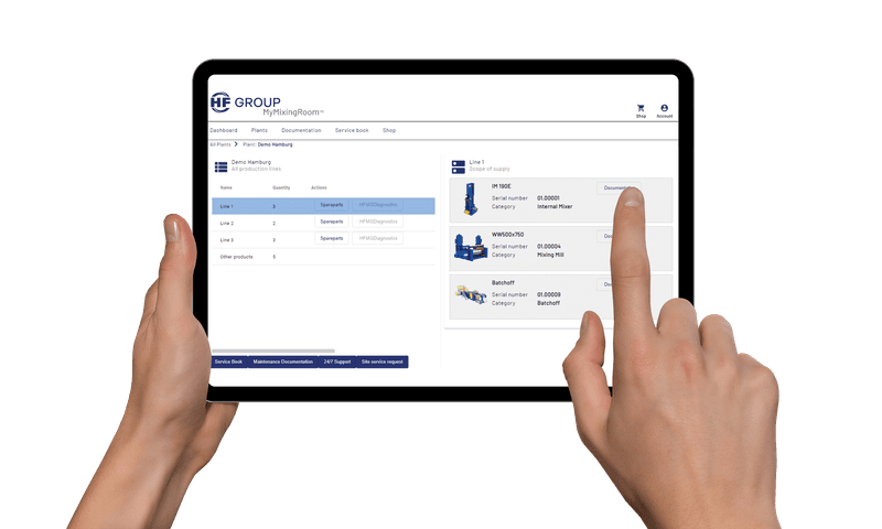 Tablet with software interface open, held and operated by two hands.