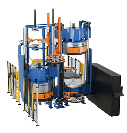 Tyre curing press with two stations, safety fencing, and vertical lifting systems.