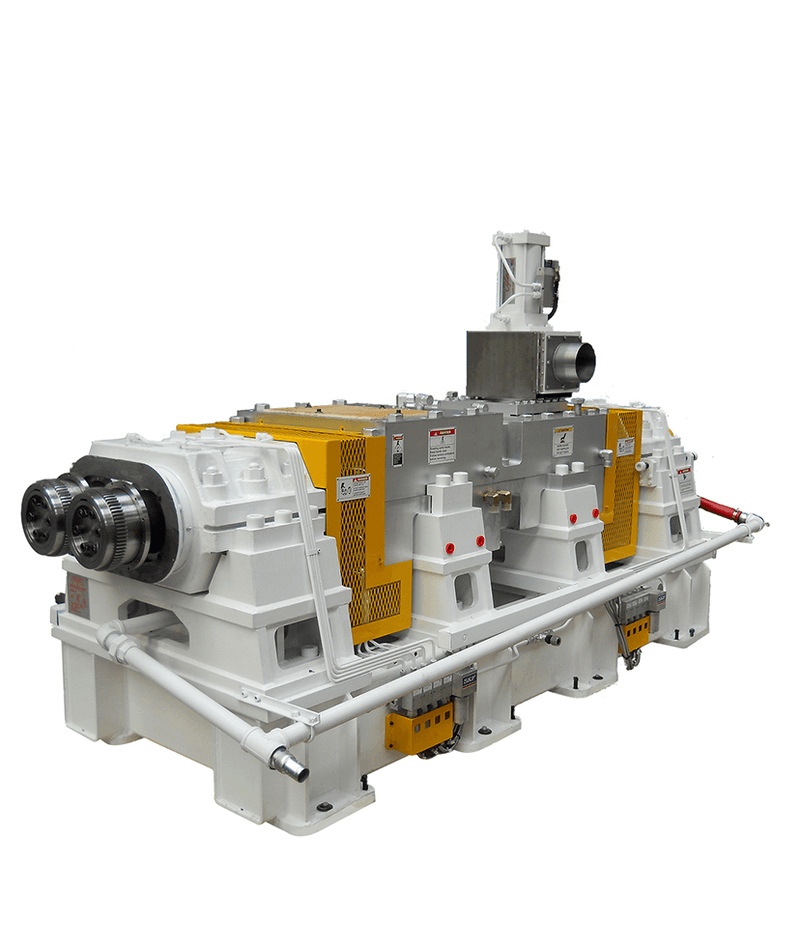 White continuous mixer with yellow covers, multiple drives, and visible mechanics.