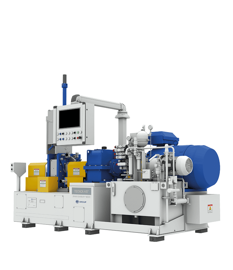Laboratory mixers with control panel, blue units, and complex hydraulic assemblies.